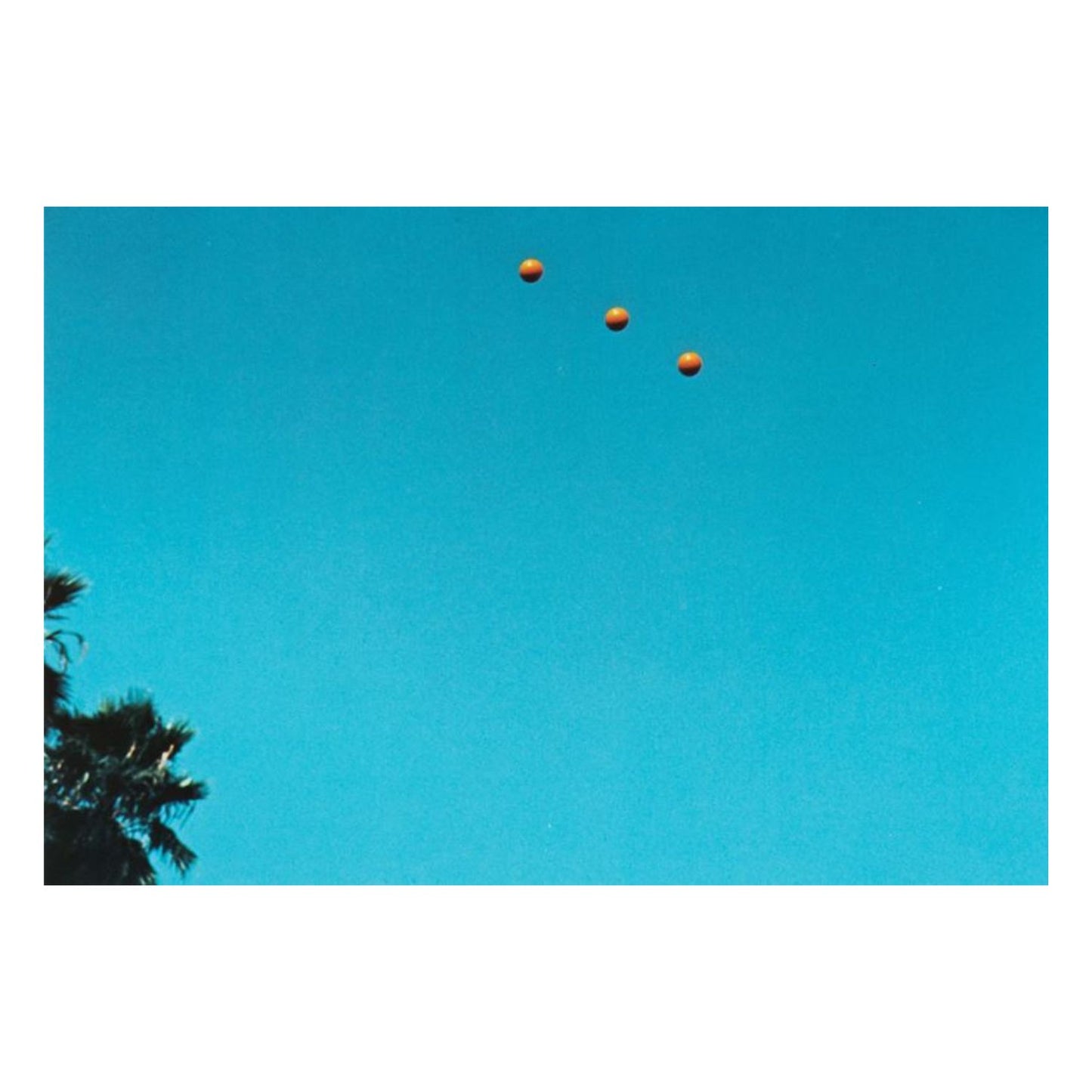 Johon Baldessari - "Throwing three balls in the air to get a straight line"